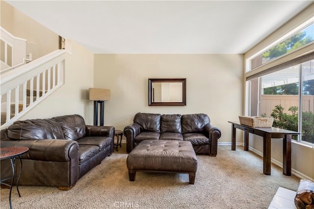 100 Stoney, Laguna Niguel, CA 92677 - living area with carpet floors, plenty of natural light, and stairway