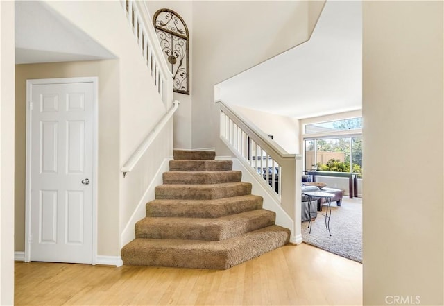 100 Stoney, Laguna Niguel, CA 92677 - stairway featuring wood finished floors and a high ceiling