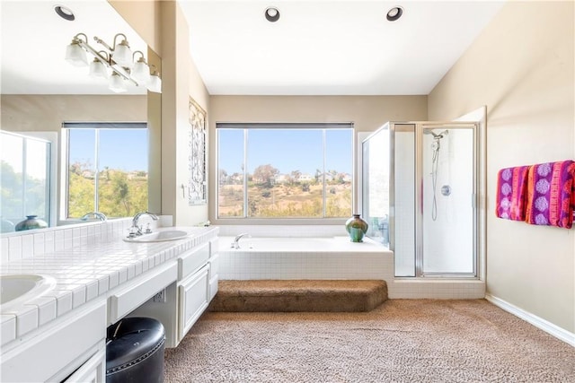100 Stoney, Laguna Niguel, CA 92677 - bathroom with a garden tub, a stall shower, double vanity, and carpet flooring