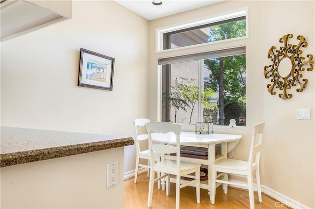 100 Stoney, Laguna Niguel, CA 92677 - dining space with light wood-style flooring and baseboards