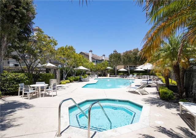 100 Stoney, Laguna Niguel, CA 92677 - community pool with a hot tub and a patio area