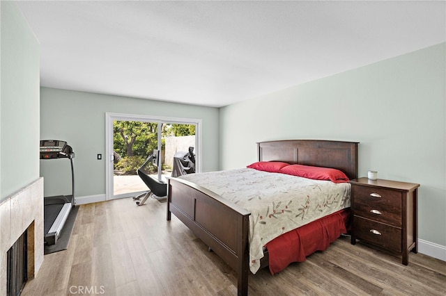 24191 Vis D Oro, Dana Point, CA 92629 - bedroom with access to exterior and wood finished floors
