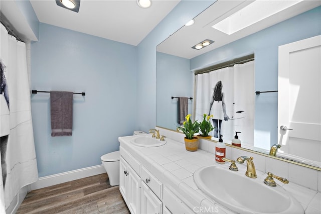 24191 Vis D Oro, Dana Point, CA 92629 - bathroom featuring wood finished floors and double vanity