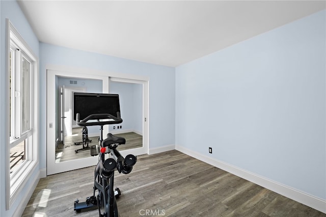 24191 Vis D Oro, Dana Point, CA 92629 - workout area featuring wood finished floors and baseboards