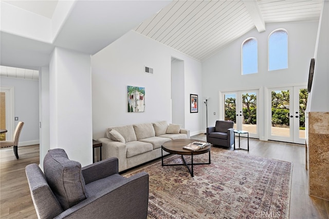 24191 Vis D Oro, Dana Point, CA 92629 - living room with wood finished floors, high vaulted ceiling, beamed ceiling, and french doors
