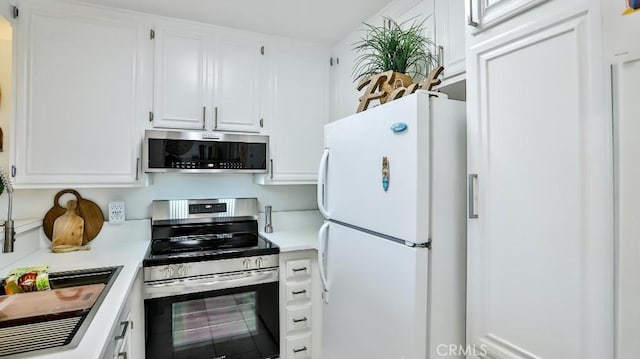 6924 Hyde Park Dr Unit 106, San Diego, CA 92119 - kitchen featuring appliances with stainless steel finishes, light countertops, and white cabinets