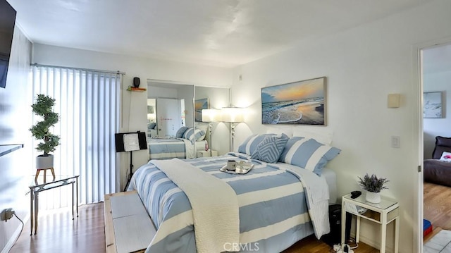 6924 Hyde Park Dr Unit 106, San Diego, CA 92119 - bedroom with wood finished floors