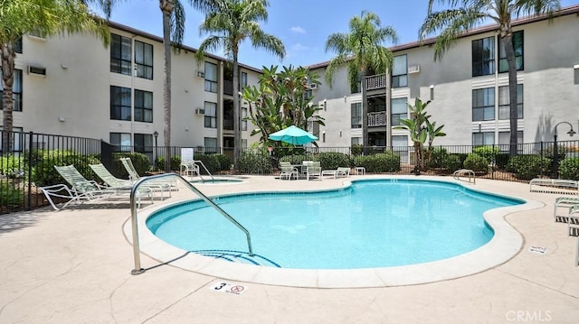6924 Hyde Park Dr Unit 106, San Diego, CA 92119 - community pool with a patio and a community hot tub