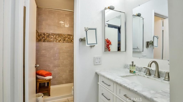 6924 Hyde Park Dr Unit 106, San Diego, CA 92119 - bathroom featuring vanity and a stall shower