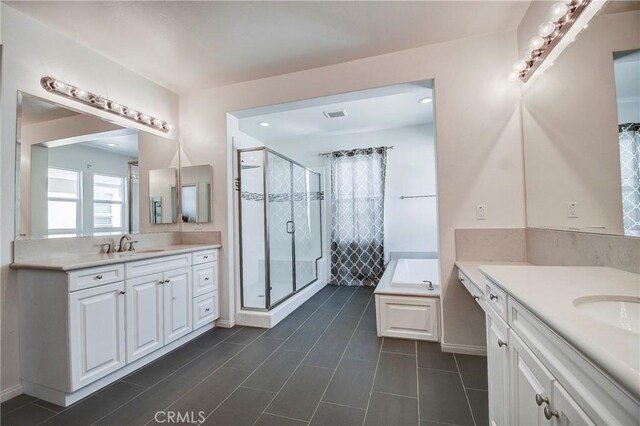 1855 W Willow Ave, Anaheim, CA 92804 - full bath featuring two vanities, a stall shower, and a garden tub