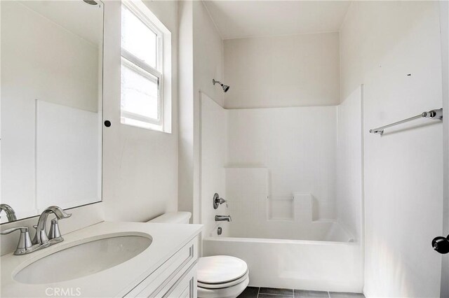 1855 W Willow Ave, Anaheim, CA 92804 - full bathroom with vanity, washtub / shower combination, and tile patterned floors