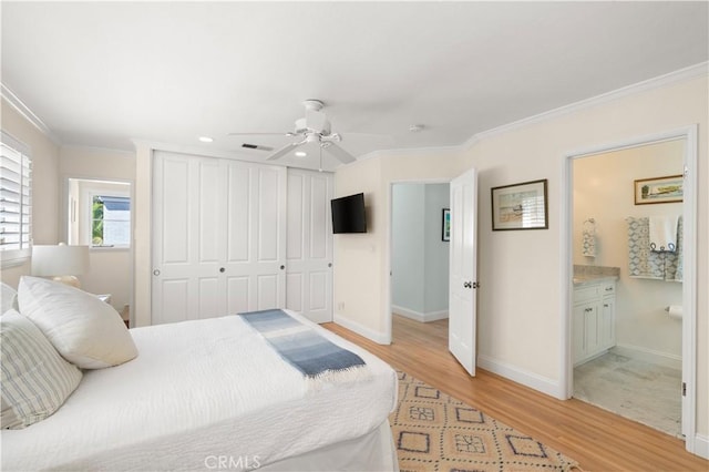 113 Via Yella, Newport Beach, CA 92663 - bedroom with light wood-style flooring, crown molding, a closet, recessed lighting, and ensuite bathroom
