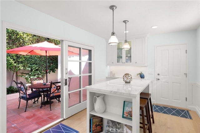 113 Via Yella, Newport Beach, CA 92663 - dining space featuring light wood-style flooring and recessed lighting
