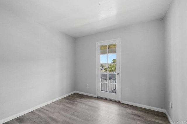 3015 Iris Ave Unit F, San Ysidro, CA 92173 - empty room with wood finished floors