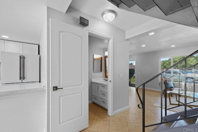 3015 Iris Ave Unit F, San Ysidro, CA 92173 - hallway with recessed lighting and light tile patterned flooring