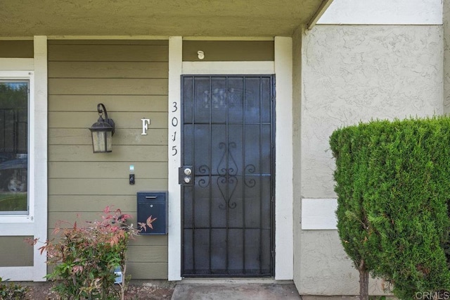 3015 Iris Ave Unit F, San Ysidro, CA 92173 - entrance to property with stucco siding