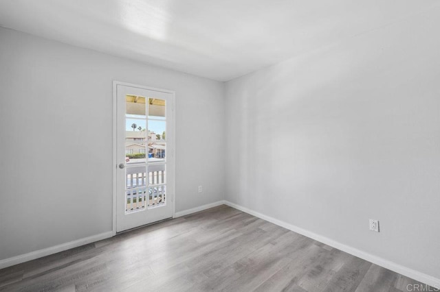 3015 Iris Ave Unit F, San Ysidro, CA 92173 - empty room with wood finished floors