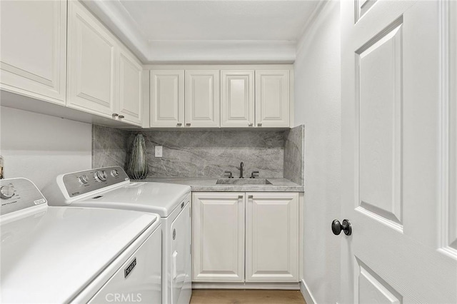 2534 Bungalow Pl Unit 87, Corona Del Mar, CA 92625 - laundry room with separate washer and dryer, cabinet space, and bar with sink