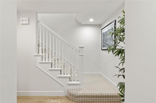 2534 Bungalow Pl Unit 87, Corona Del Mar, CA 92625 - stairway featuring recessed lighting and wood finished floors
