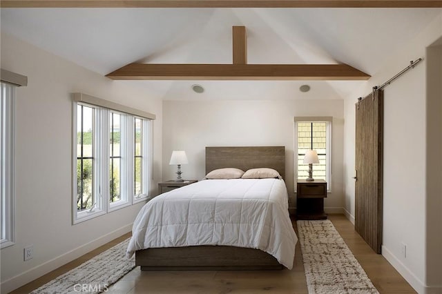 2534 Bungalow Pl Unit 87, Corona Del Mar, CA 92625 - bedroom with multiple windows and light wood-style floors