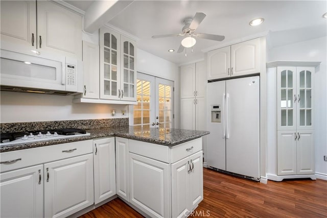 1321 Edgemont St, La Habra, CA 90631 - kitchen with white appliances, glass insert cabinets, white cabinetry, a ceiling fan, and a peninsula