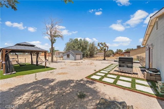 43249 42nd St W, Lancaster, CA 93536 - view of yard with a gazebo and a storage shed