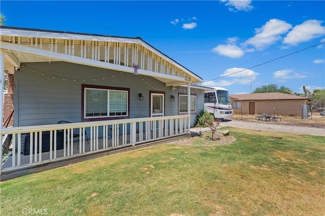 43249 42nd St W, Lancaster, CA 93536 - view of property exterior featuring a yard