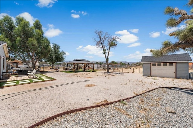 43249 42nd St W, Lancaster, CA 93536 - view of yard featuring a gazebo, an outbuilding, and a garage