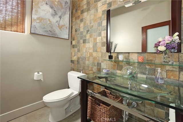 23640 Aster Trl, Calabasas, CA 91302 - half bath with tile patterned flooring and tile walls