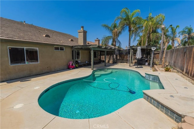 10606 Anacostia Way, Bakersfield, CA 93311 - view of swimming pool featuring a pergola, a fenced backyard, and a patio area