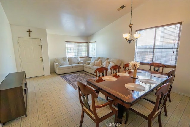 10606 Anacostia Way, Bakersfield, CA 93311 - dining space with lofted ceiling, a chandelier, and light tile patterned floors