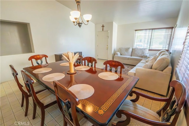 10606 Anacostia Way, Bakersfield, CA 93311 - tiled dining room featuring a chandelier