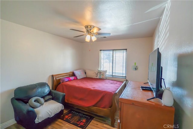10606 Anacostia Way, Bakersfield, CA 93311 - bedroom featuring a ceiling fan and wood finished floors