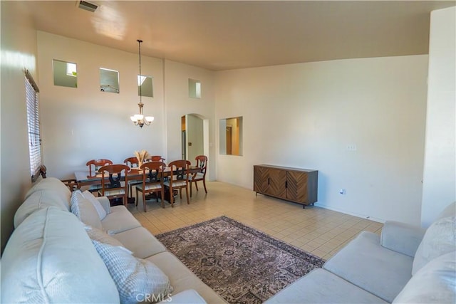 10606 Anacostia Way, Bakersfield, CA 93311 - tiled living room with arched walkways