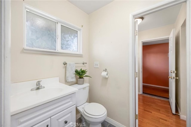 1206 E Vine Ave, West Covina, CA 91790 - half bath featuring vanity and wood finished floors