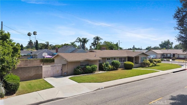 1206 E Vine Ave, West Covina, CA 91790 - single story home featuring driveway, a gate, and a residential view