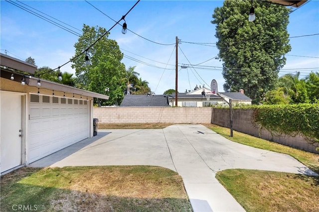 1206 E Vine Ave, West Covina, CA 91790 - fenced backyard featuring a garage