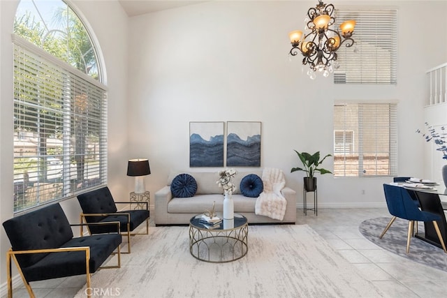 4262 Havenridge, Corona, CA 92883 - living area featuring a towering ceiling, a chandelier, and tile patterned floors