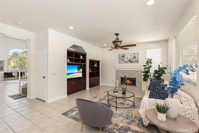 4262 Havenridge, Corona, CA 92883 - living area with light tile patterned flooring, a ceiling fan, a tile fireplace, and recessed lighting