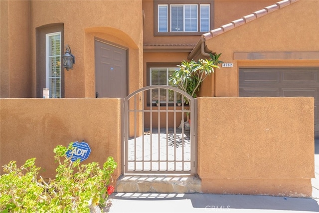 4262 Havenridge, Corona, CA 92883 - entrance to property featuring stucco siding and a gate