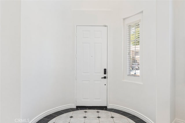 4262 Havenridge, Corona, CA 92883 - entryway with dark tile patterned flooring and inlaid floor details
