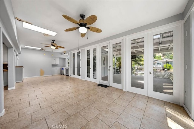 7762 Cora Dr, Lucerne, CA 95458 - unfurnished sunroom with french doors and a skylight
