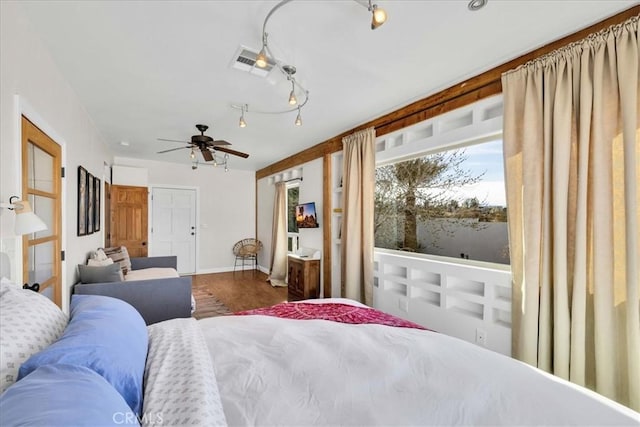 7423 Juniper Rd, Joshua Tree, CA 92252 - bedroom with wood finished floors and baseboards
