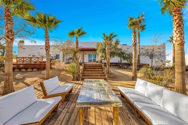 7423 Juniper Rd, Joshua Tree, CA 92252 - wooden terrace with outdoor lounge area and stairway