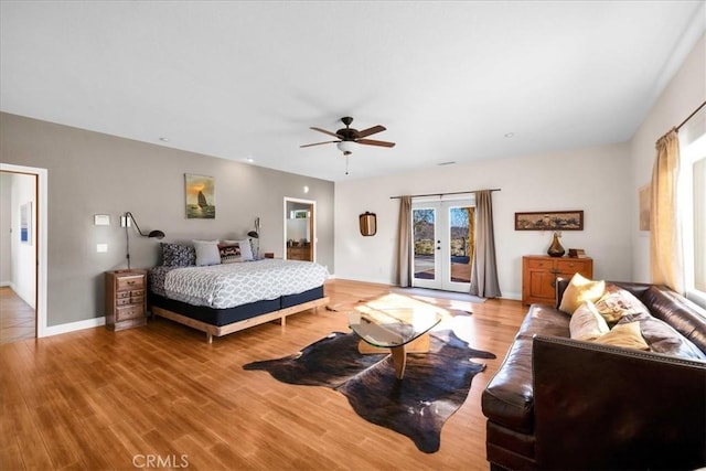 7423 Juniper Rd, Joshua Tree, CA 92252 - bedroom with access to outside, light wood-type flooring, and a ceiling fan