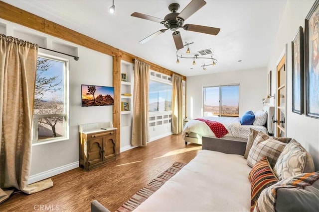 7423 Juniper Rd, Joshua Tree, CA 92252 - bedroom with wood finished floors and ceiling fan
