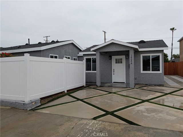 1402 E Luray St, Long Beach, CA 90807 - view of front of house featuring a patio area and stucco siding