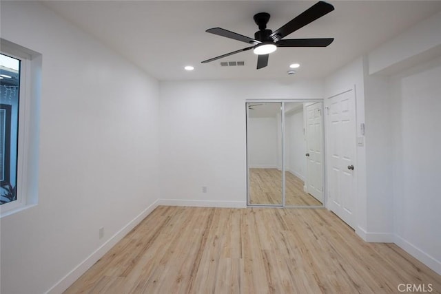 1402 E Luray St, Long Beach, CA 90807 - unfurnished bedroom with wood finished floors, recessed lighting, a closet, and ceiling fan