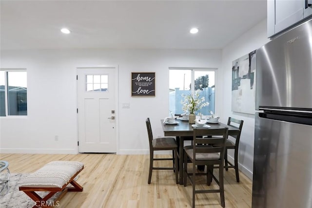 1402 E Luray St, Long Beach, CA 90807 - dining room with light wood finished floors and recessed lighting