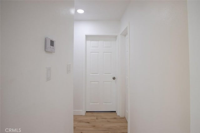 1402 E Luray St, Long Beach, CA 90807 - hall with light wood-style flooring and recessed lighting
